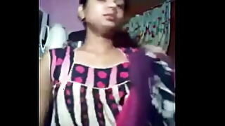 Voluptuous Indian housewife sheds her sari for a sensual cam show, teasing with her ample assets.