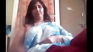 Desi MILF indulges in a steamy threesome, mentoring a younger couple in the art of pleasure, showcasing her expertise and insatiable appetite.