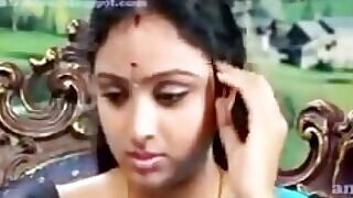 Sensual South Indian aunty indulges in pleasurable activities in a Tamil XXX video.